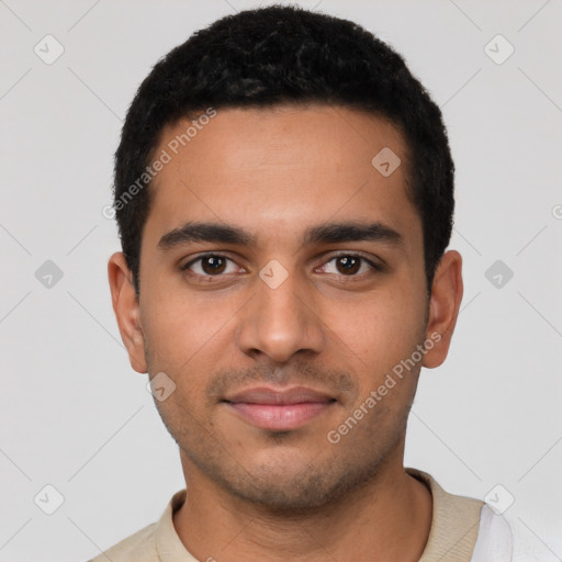 Neutral latino young-adult male with short  black hair and brown eyes