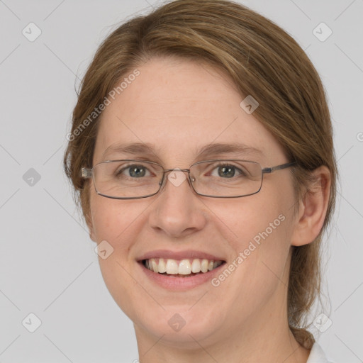 Joyful white young-adult female with medium  brown hair and green eyes