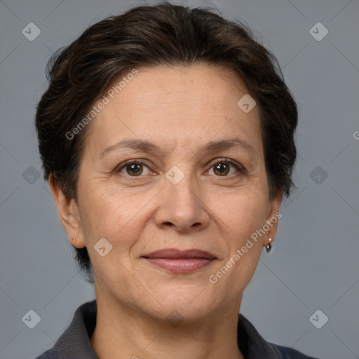 Joyful white adult female with short  brown hair and brown eyes