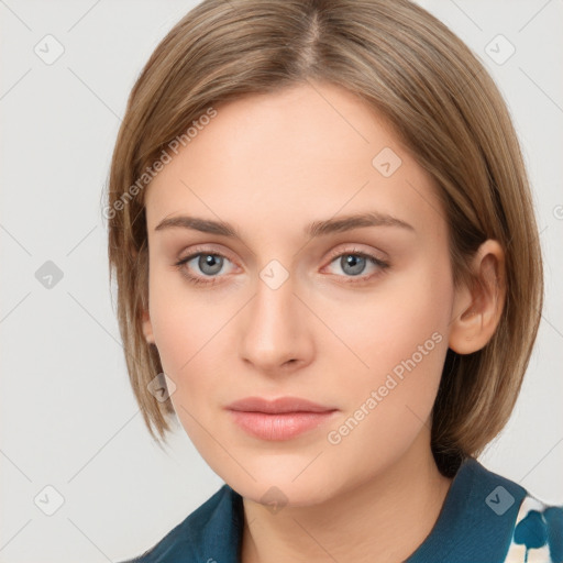 Neutral white young-adult female with medium  brown hair and grey eyes