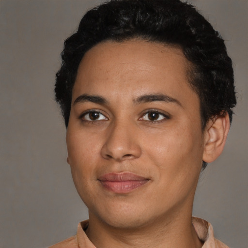 Joyful latino young-adult female with short  black hair and brown eyes