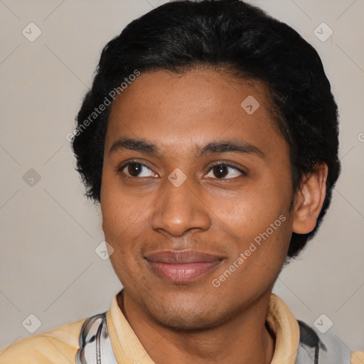 Joyful latino young-adult male with short  black hair and brown eyes