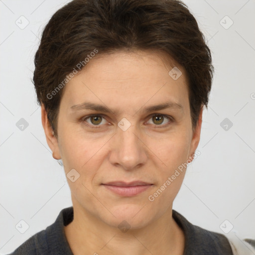 Joyful white adult female with short  brown hair and brown eyes