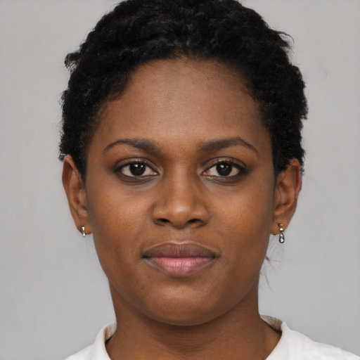 Neutral black young-adult female with short  black hair and brown eyes