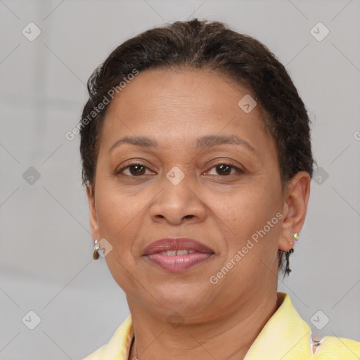 Joyful white adult female with short  brown hair and brown eyes