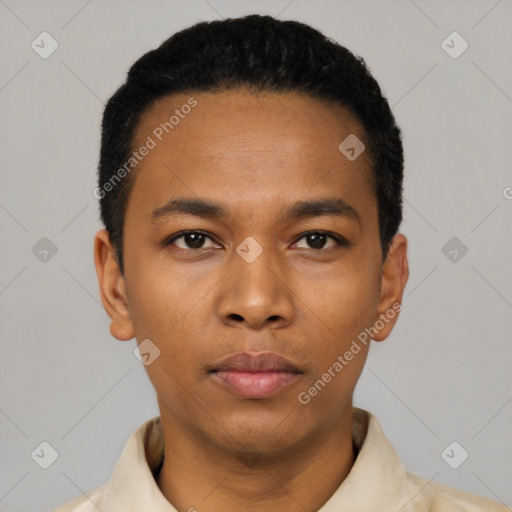 Neutral latino young-adult male with short  black hair and brown eyes