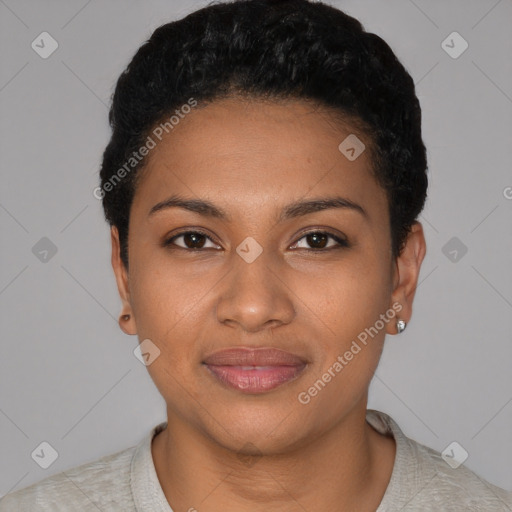 Joyful black young-adult female with short  black hair and brown eyes