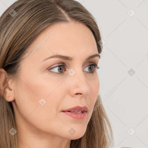 Neutral white young-adult female with long  brown hair and grey eyes