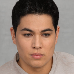 Neutral latino young-adult male with short  brown hair and brown eyes