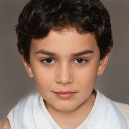 Joyful white child male with short  brown hair and brown eyes