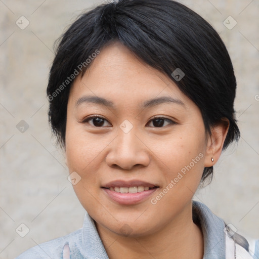 Joyful asian young-adult female with medium  black hair and brown eyes