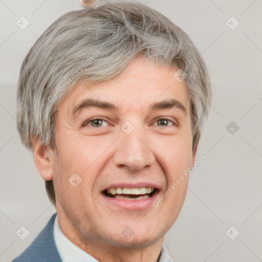 Joyful white adult male with short  brown hair and grey eyes