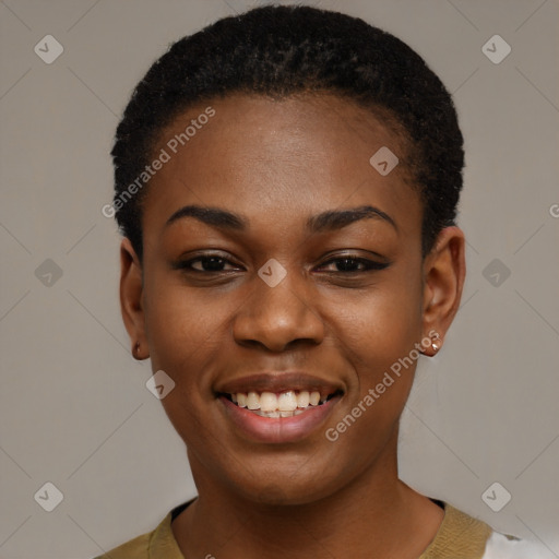 Joyful black young-adult female with short  black hair and brown eyes