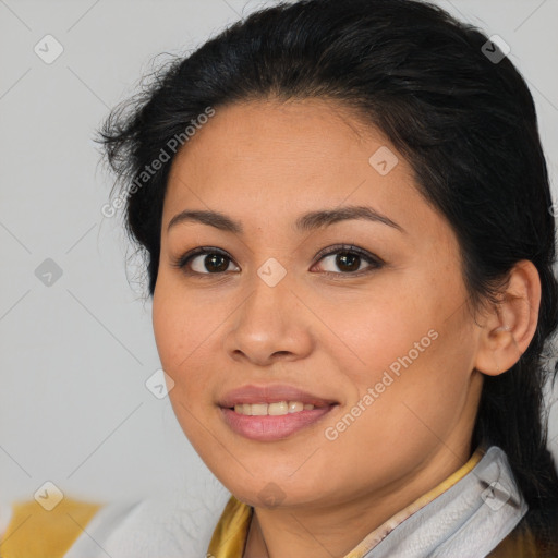 Joyful latino young-adult female with medium  brown hair and brown eyes