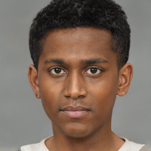 Neutral black young-adult male with short  brown hair and brown eyes