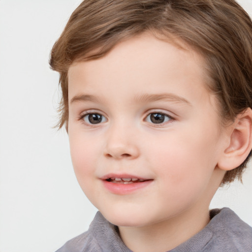 Joyful white child female with medium  brown hair and grey eyes