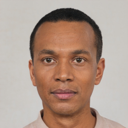 Neutral black adult male with short  black hair and brown eyes