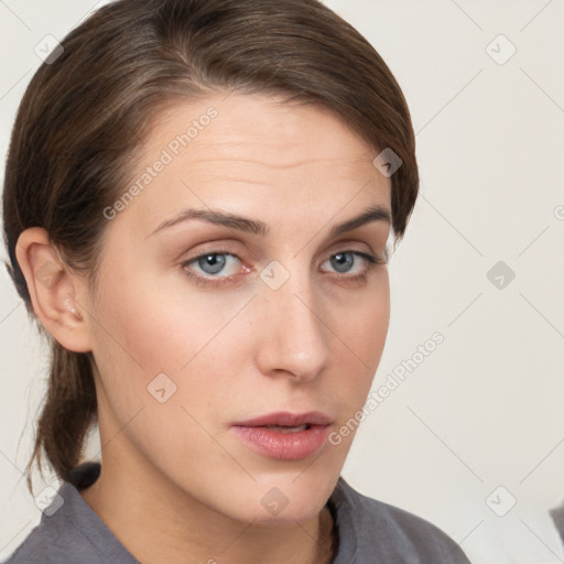 Neutral white young-adult female with medium  brown hair and grey eyes