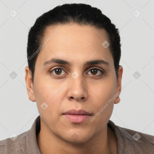 Neutral latino young-adult male with short  brown hair and brown eyes