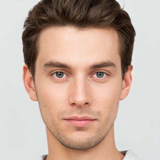 Neutral white young-adult male with short  brown hair and brown eyes