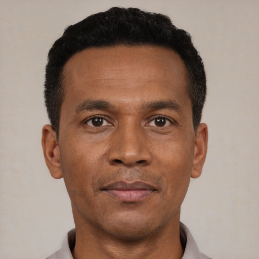 Neutral black young-adult male with short  black hair and brown eyes