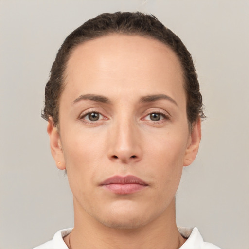 Neutral white young-adult female with short  brown hair and brown eyes