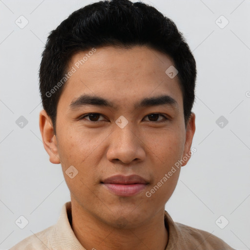 Joyful asian young-adult male with short  brown hair and brown eyes