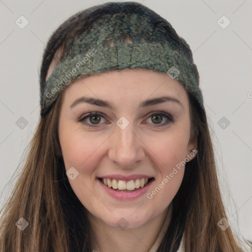 Joyful white young-adult female with long  brown hair and grey eyes