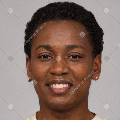 Joyful black young-adult female with short  black hair and brown eyes