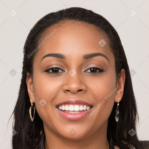 Joyful latino young-adult female with long  black hair and brown eyes