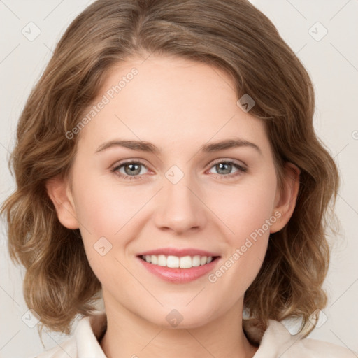 Joyful white young-adult female with medium  brown hair and green eyes