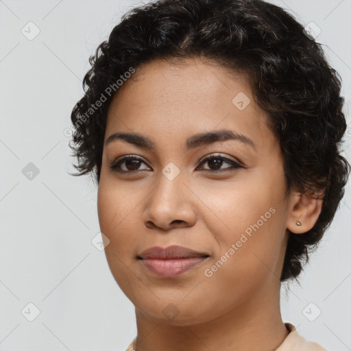 Joyful latino young-adult female with long  brown hair and brown eyes