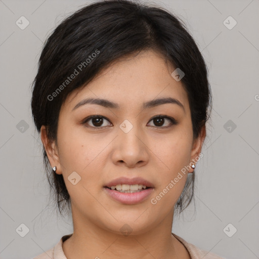 Joyful asian young-adult female with medium  black hair and brown eyes