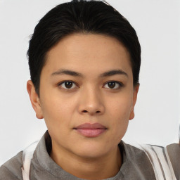 Joyful asian young-adult female with short  brown hair and brown eyes