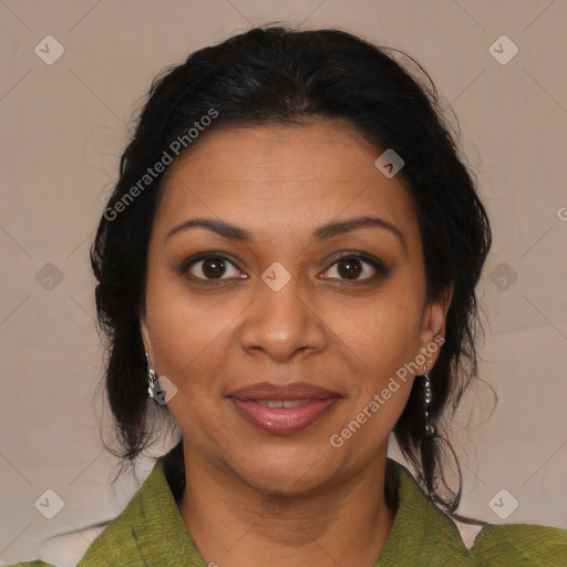 Joyful black adult female with medium  brown hair and brown eyes