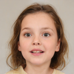 Joyful white child female with medium  brown hair and brown eyes