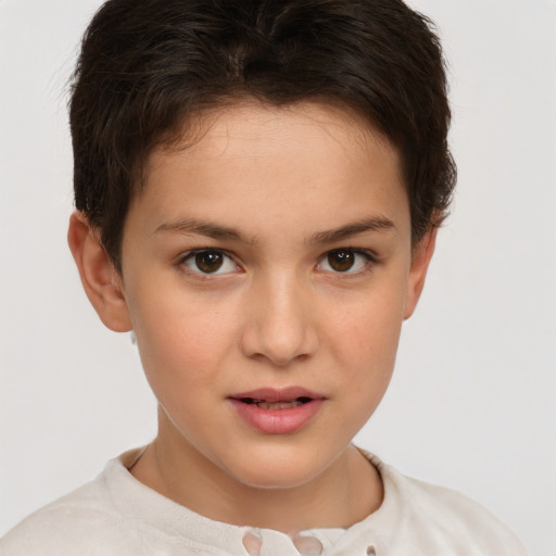 Joyful white child female with short  brown hair and brown eyes