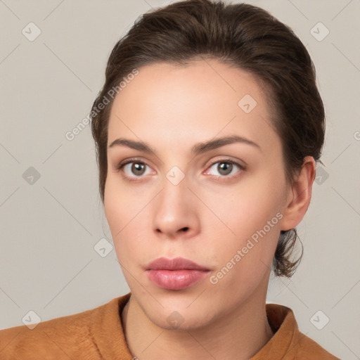 Neutral white young-adult female with medium  brown hair and brown eyes