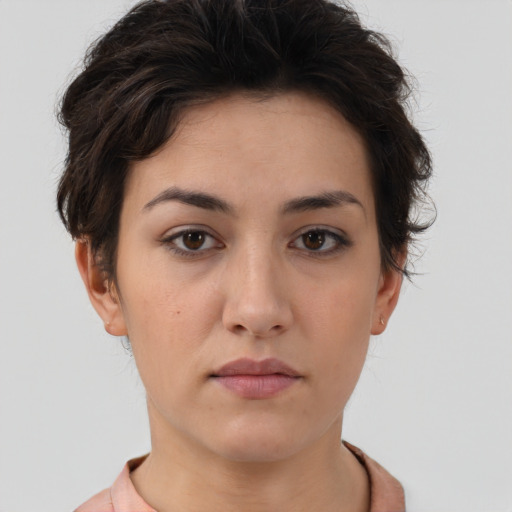 Neutral white young-adult female with short  brown hair and brown eyes