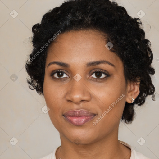 Joyful black young-adult female with medium  black hair and brown eyes