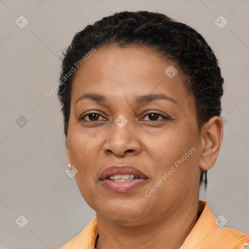 Joyful latino adult female with short  brown hair and brown eyes