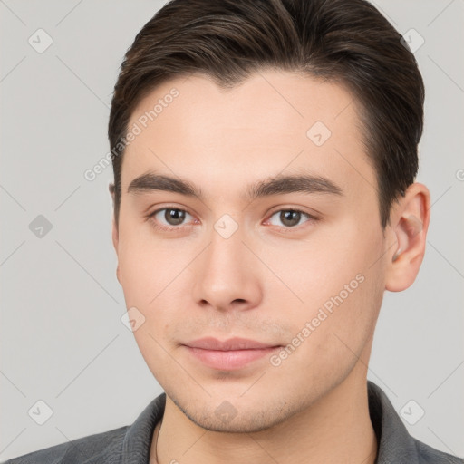 Neutral white young-adult male with short  brown hair and brown eyes