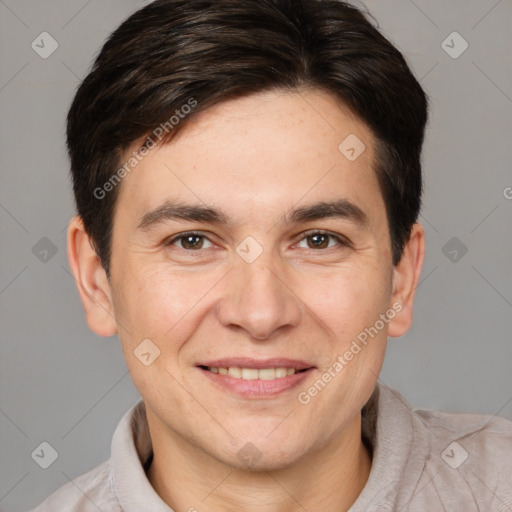 Joyful white adult male with short  brown hair and brown eyes