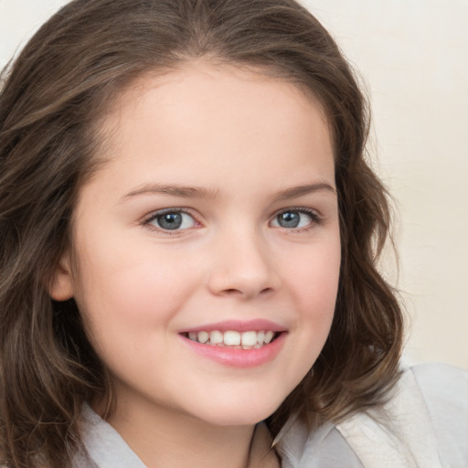 Joyful white child female with medium  brown hair and grey eyes