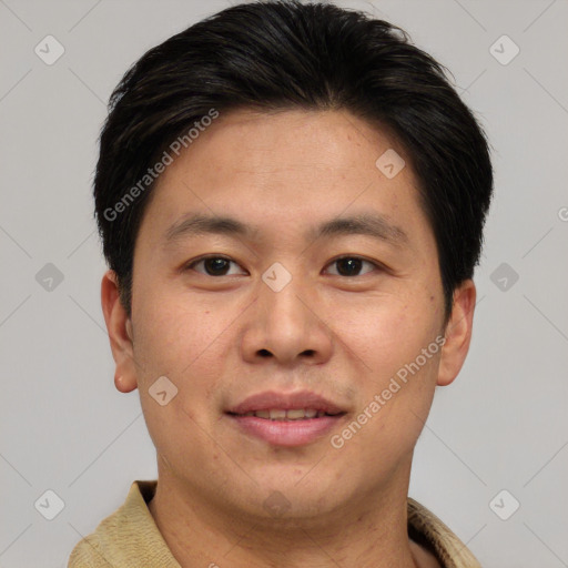 Joyful asian young-adult male with short  brown hair and brown eyes