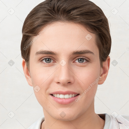 Joyful white young-adult female with short  brown hair and grey eyes