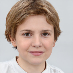 Joyful white child female with medium  brown hair and brown eyes