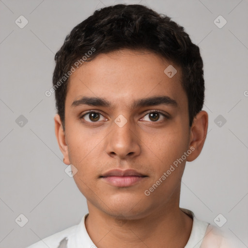 Neutral latino young-adult male with short  black hair and brown eyes