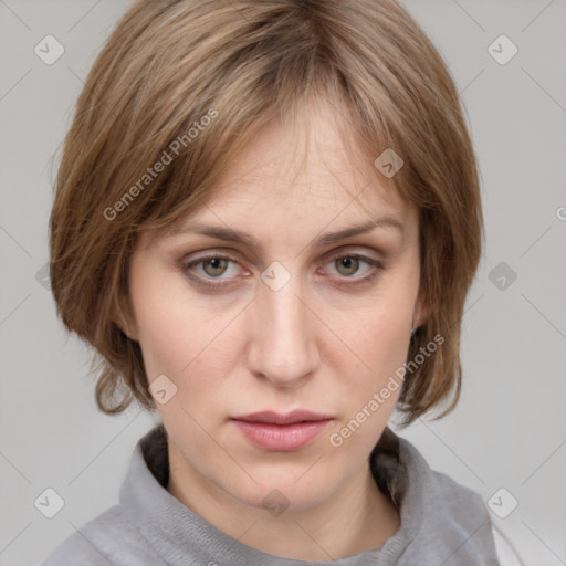 Neutral white young-adult female with medium  brown hair and grey eyes