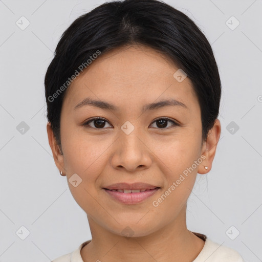 Joyful asian young-adult female with short  brown hair and brown eyes